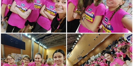 Powiększ grafikę: Uczennice na hali sportowej w różowych koszulkach